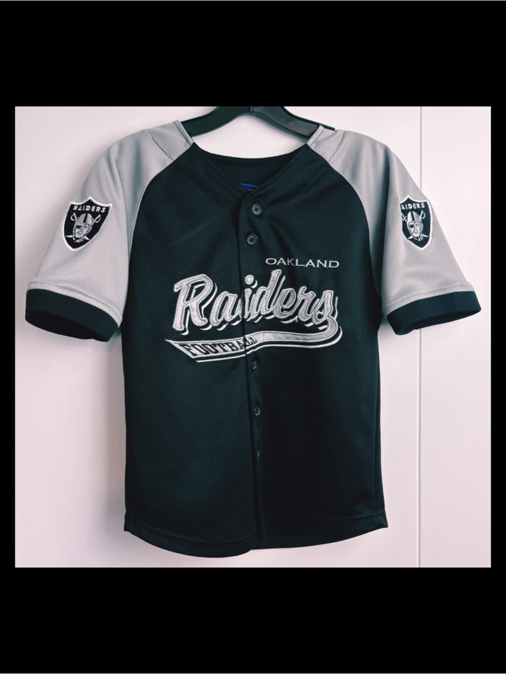 Reebok Oakland Raiders NFL Jersey Youth
Small 8 Black Silver Button Front